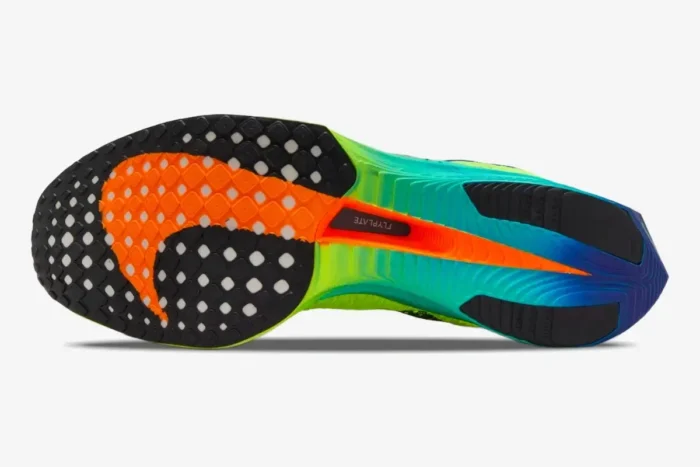 Outsole view of Nike ZoomX Vaporfly 3 marathon racer in yellow, blue, and orange with Flyplate detail. - SKU DV4129-700