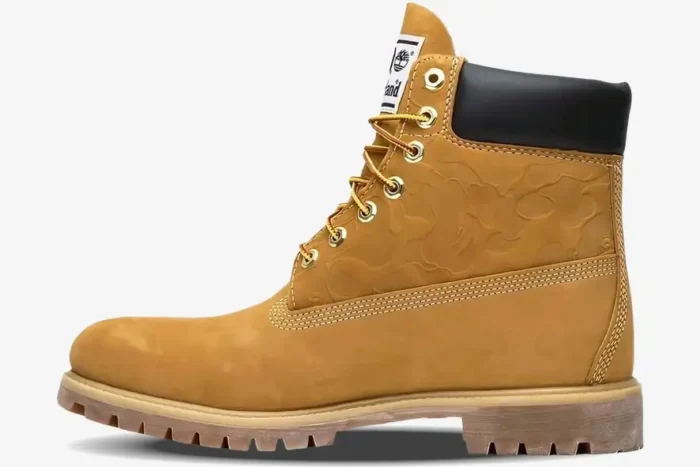 Timberland x BAPE x Undefeated 6 Inch Wheat boot in a side profile view with embossed camo pattern. - SKU TB0A1R7Y231