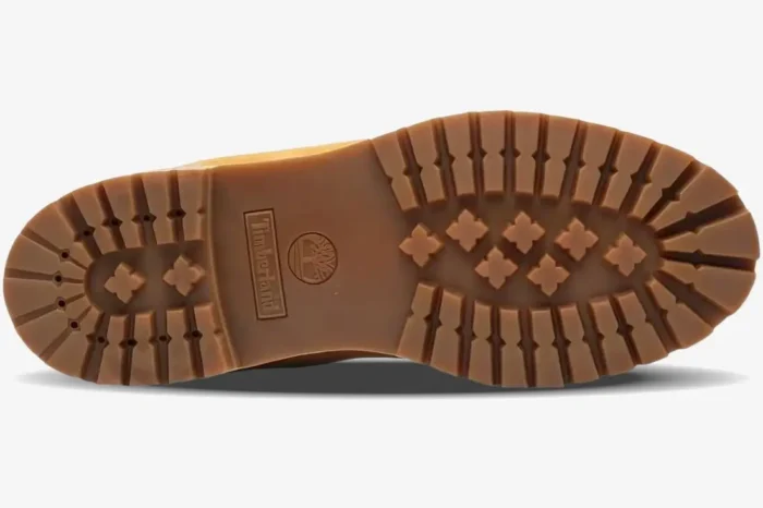 Bottom view of the gum rubber outsole on a Timberland x BAPE x Undefeated 6 Inch Wheat boot. - SKU TB0A1R7Y231