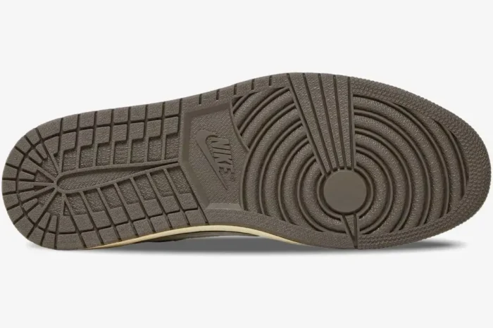 Bottom view of the brown rubber outsole of the Travis Scott x Air Jordan 1 Retro Low OG Reverse Mocha. - SKU DM7866-162