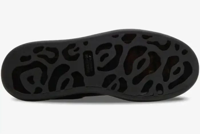 Bottom view of Alexander McQueen Oversized sneaker featuring a black leopard-patterned rubber sole. - SKU 604232-WHX98-1000