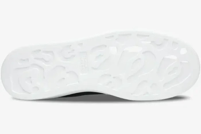 Bottom view of the white leopard-patterned outsole of an Alexander McQueen Oversized Sneaker. - SKU 553680-WHGP5-1070