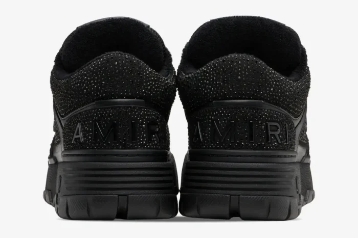 Rear view of black Amiri MA-1 sneakers featuring crystal rhinestone embellishments and embossed heel logo. - SKU AMFOSR1038-001
