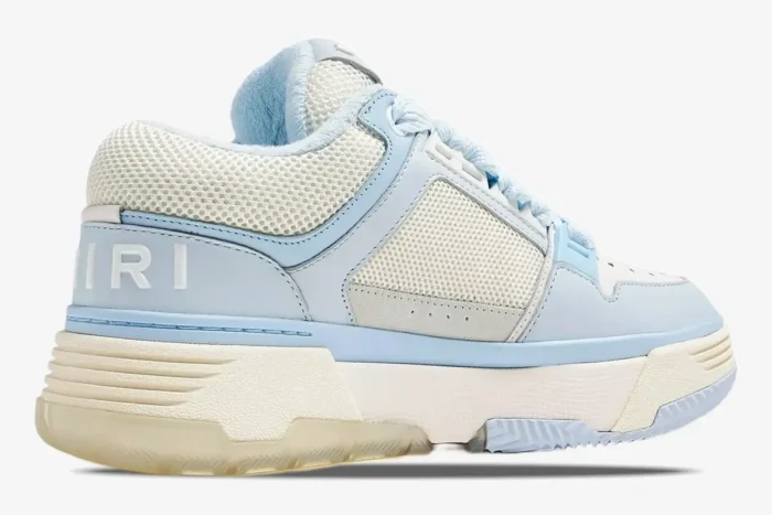 Amiri MA-1 luxury skate sneaker in white and light blue, rear side view showing the heel logo. - SKU MFS001-111