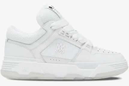 Side profile of an all-white Amiri MA-1 luxury skate sneaker with chunky soles and mesh panels. - SKU AMFOSR1097-100