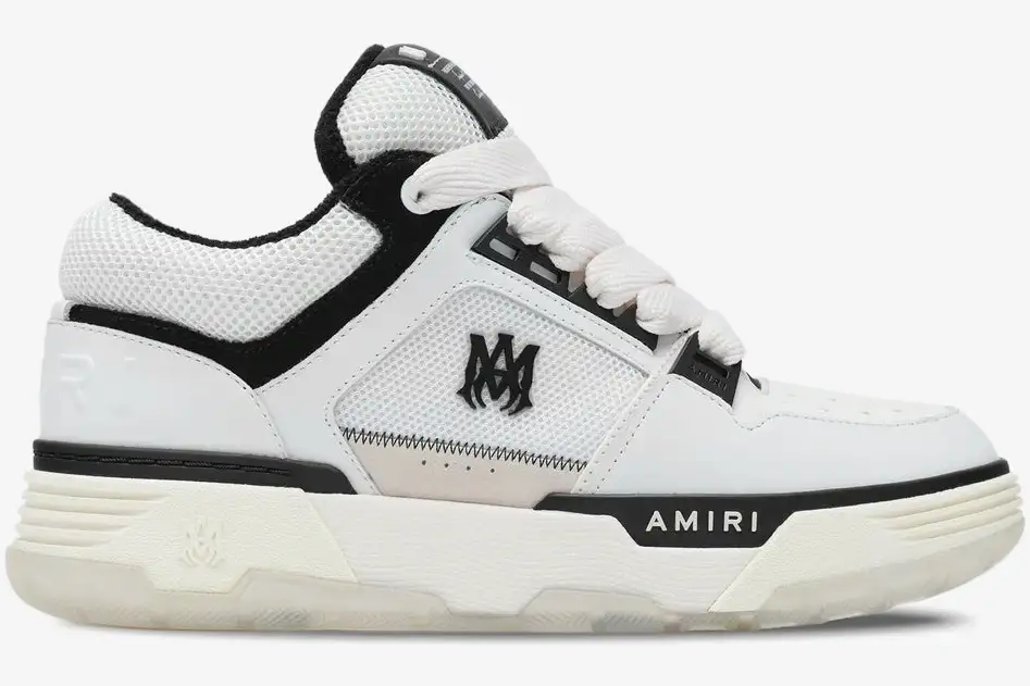 amiri-ma1-nappa-white-black-side-view-amfosr1097-111-237-784 Side profile of an Amiri MA-1 Nappa luxury skate sneaker in white and black with chunky soles and mesh panels. - SKU AMFOSR1097-111