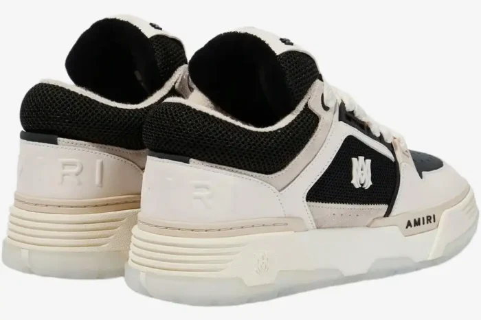 Amiri MA-1 White Black premium sneakers shown from a rear three-quarter angle with chunky soles. - SKU PF23MFS010-111