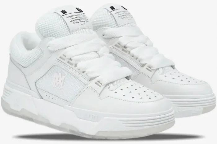 Amiri MA-1 luxury skate sneakers in white, shown from a three-quarter front angle. - SKU AMFOSR1097-100