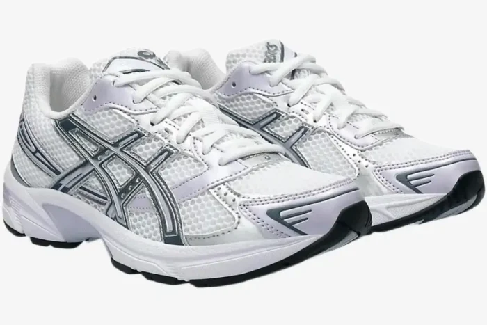 A pair of Asics Gel-1130 White Faded Ash Rock sneakers in a three-quarter front view. - SKU 1202A164113