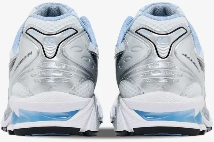 Rear view of ASICS Gel-Kayano 14 x JJJJound sneakers in white, silver, and light blue showing heel details. - SKU 1203A961-101