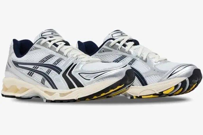 ASICS Gel Kayano 14 x JJJJound sneakers in white and midnight navy, three-quarter front view. - SKU 1203A961-100