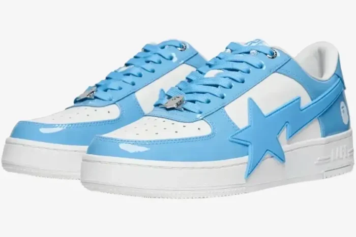 A pair of Bape STA OS #3 M2 sneakers in blue and white patent leather, shown from a three-quarter side angle. - SKU 0ZXSHMX91310NBLA