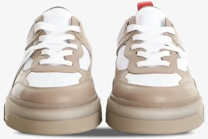 Front view of Christian Louboutin Astroloubi sneakers in beige and white with red accents. - SKU 1240001F688