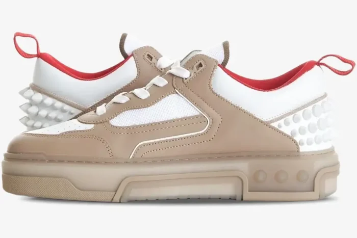 Side profile of Christian Louboutin Astroloubi sneakers in beige, white, and red with spiked heels. - SKU 1240001F688