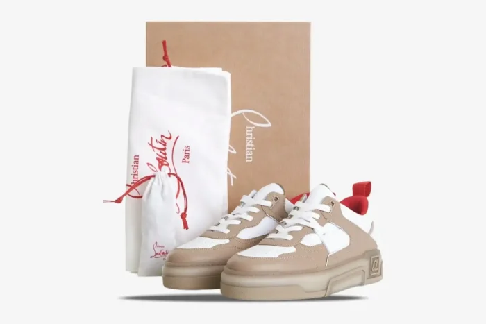 Christian Louboutin Astroloubi sneakers in beige and white with red accents and packaging, front view. - SKU 1240001F688