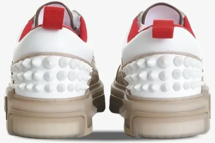 Rear view of Christian Louboutin Astroloubi sneakers in beige, white, and red with spiked heels. - SKU 1240001F688