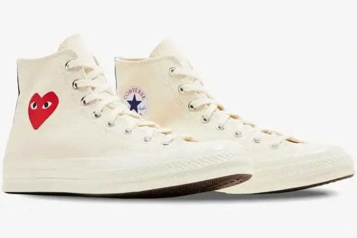 Converse x CDG Play Chuck 70 high-top sneakers in parchment white, side profile view showing red heart logo. - SKU A08800C