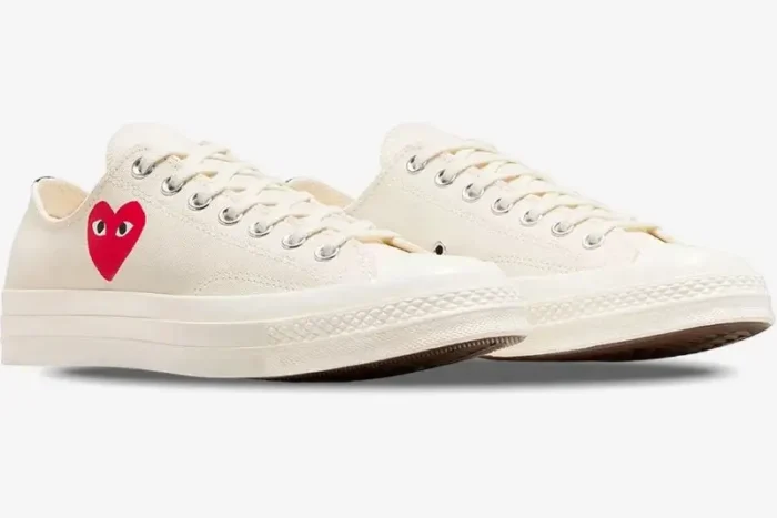 White Converse x Comme des Garçons Play Chuck 70 low-top sneakers, side perspective view. - SKU A08805C
