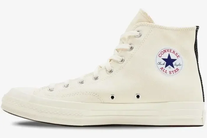 Side profile of cream Converse Chuck Taylor All Star 70s high-top canvas sneakers. - SKU A08800C
