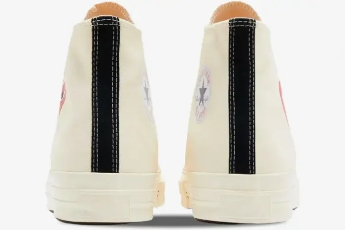 Rear view of off-white Converse x CDG Play high-top sneakers with black heel stripes. - SKU A08800C