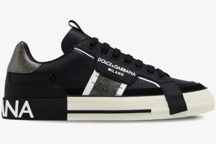 Dolce & Gabbana 2.Zero low top sneaker in black, white, and silver, shown from a side profile view. - SKU CS1863A02238B979