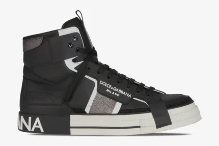 Side profile of Dolce & Gabbana 2.Zero high-top sneakers in black, white, and silver. - SKU CS1870AO22301