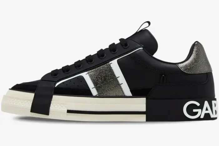 Dolce & Gabbana 2.Zero low top sneaker in black, white, and silver, shown from a side profile view. - SKU CS1863A02238B979