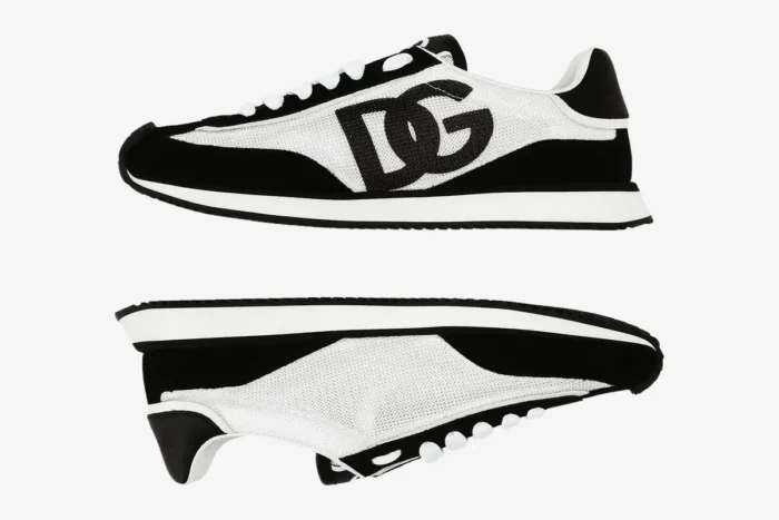 Side view of Dolce & Gabbana Cushion Sneakers in black and white mesh with a large DG logo. - SKU CK2288A53558I050