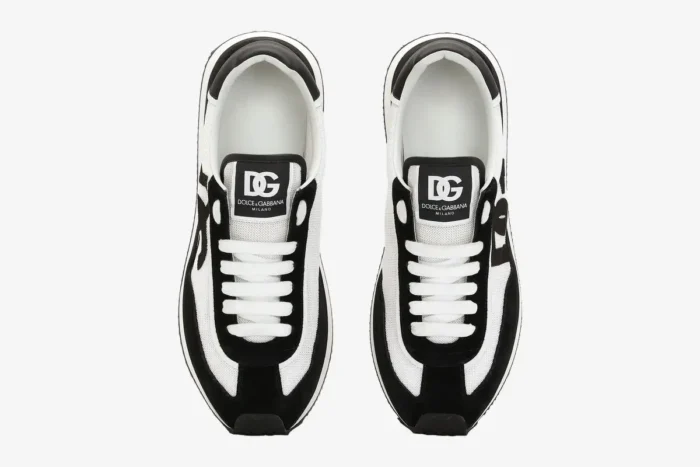 Top-down view of Dolce & Gabbana Cushion Sneakers in black and white with logo on tongue. - SKU CK2288A53558I050