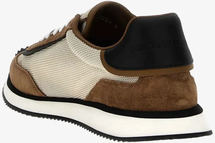 Rear view of Dolce & Gabbana Cushion Sneaker in white, beige, and brown suede with black heel logo. - SKU CS2288A3D2489651