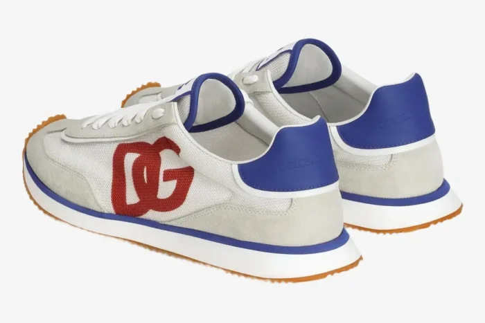 Rear view of Dolce & Gabbana Cushion Sneakers in white and blue with a red logo and orange gum sole. - SKU CS2288A535589926