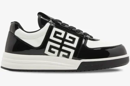 Side view of Givenchy G4 sneakers in two-tone black and white patent leather with 4G logo. - SKU BH007WH1HJ-004