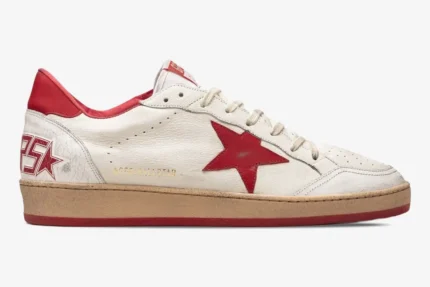 Side profile of Golden Goose Ball Star sneakers in white leather with a red star and beige sole. - SKU GMF00117-F000325-10275