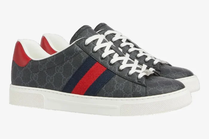 Side view of Gucci Ace GG Supreme canvas sneakers in grey with red and blue web stripes and white soles. - SKU 760775FACMZ1065