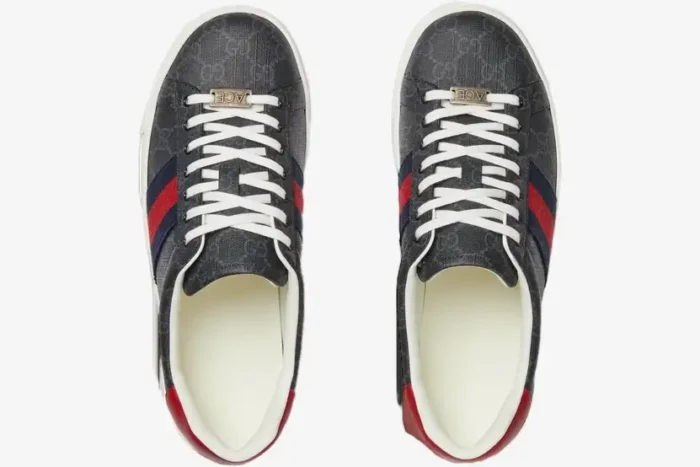 Top-down view of Gucci Ace GG Supreme canvas sneakers in dark grey with red and blue web stripes and white laces. - SKU 760775FACMZ1065