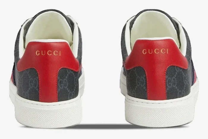 Rear view of Gucci Ace GG Supreme canvas sneakers with red leather heel tabs and gold logo. - SKU 760775FACMZ1065