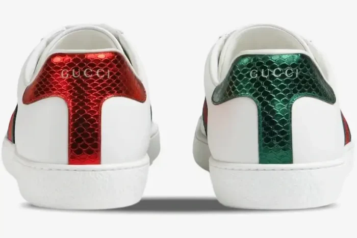 Rear view of Gucci Ace white leather sneakers with red and green snakeskin heel tabs. - SKU 42944602JP09064