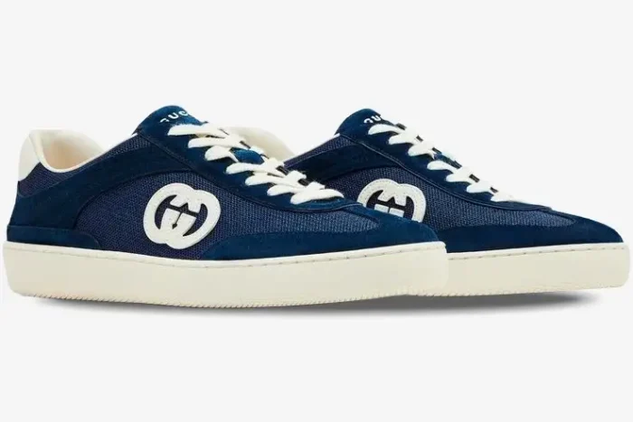 Gucci G74 blue suede sneakers with white interlocking G logo, side profile view. - SKU 791742AADM04141