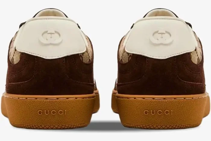 Back view of Gucci G75 sneakers in dark brown suede with white heel tabs and gum soles. - SKU 791742AAEGA2242