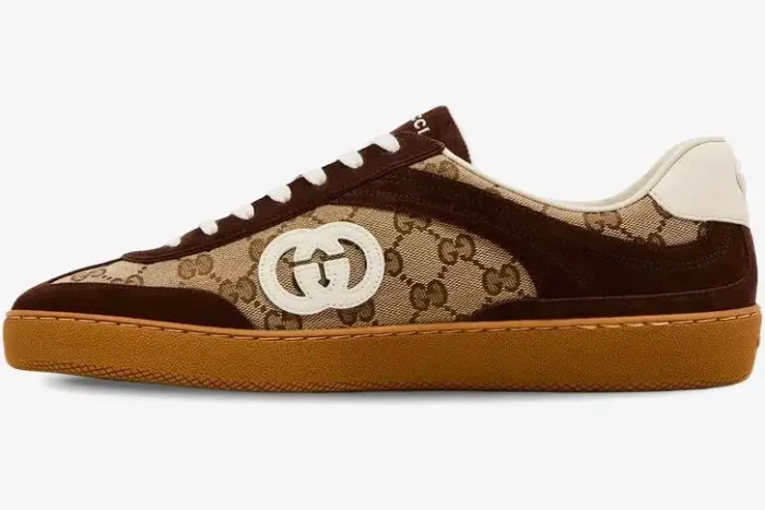 Side profile of Gucci G75 Interlocking G sneaker in dark brown suede and GG canvas with a gum sole. - SKU 791742AAEGA2242
