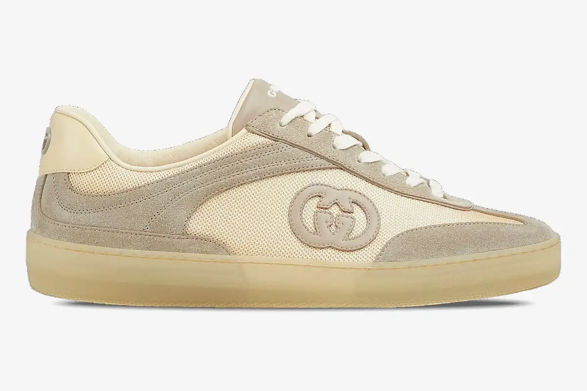 gucci-interlocking-g-sneaker-oatmeal-side-view-791742aaecn9548-665-269 Side view of Gucci Interlocking G sneaker in oatmeal suede and mesh with a translucent gum sole. - SKU 791742AAECN9548