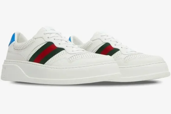 Gucci Mac80 chunky white sneakers with green and red web stripe and blue heel, three-quarter side view. - SKU 669698UPG109060