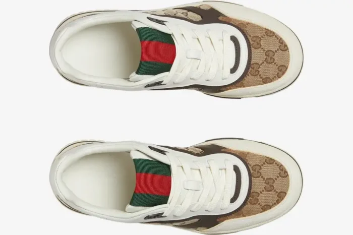 Top-down view of Gucci Re-Web sneakers in beige ebony GG canvas with white leather trim and green-red web tongue. - SKU 787476AADHW9568