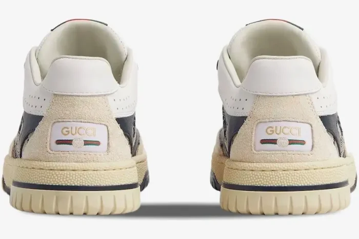 Rear view of Gucci Re-Web Sneakers in beige, ivory, and blue GG canvas with logo heel patch. - SKU 787476-AADHW-9552