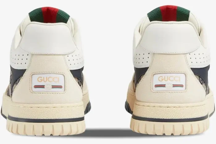 Rear view of Gucci Re-Web sneakers in beige, ivory, and blue GG canvas featuring logo heel patches. - SKU 787476AADHW9552