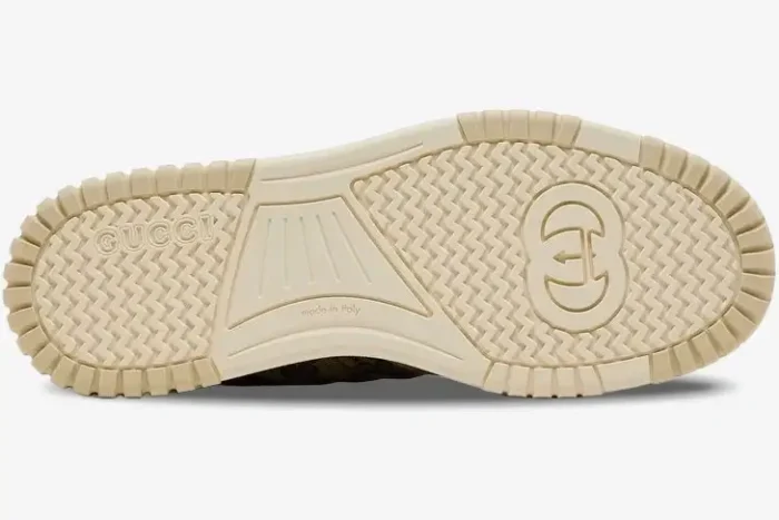 Bottom view of the beige Gucci Re-Web sneaker sole featuring the interlocking G logo and zigzag tread. - SKU 787476-AADHW-9573