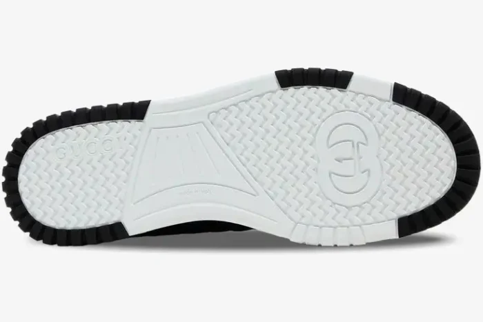 Bottom view of Gucci Re-Web Sneaker GG Canvas in black, showing the white rubber sole with logo. - SKU 787476AADHW1077