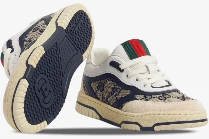 Gucci Re-Web Sneaker in beige ivory blue GG canvas, side view and sole detail. - SKU 787476-AADHW-9552