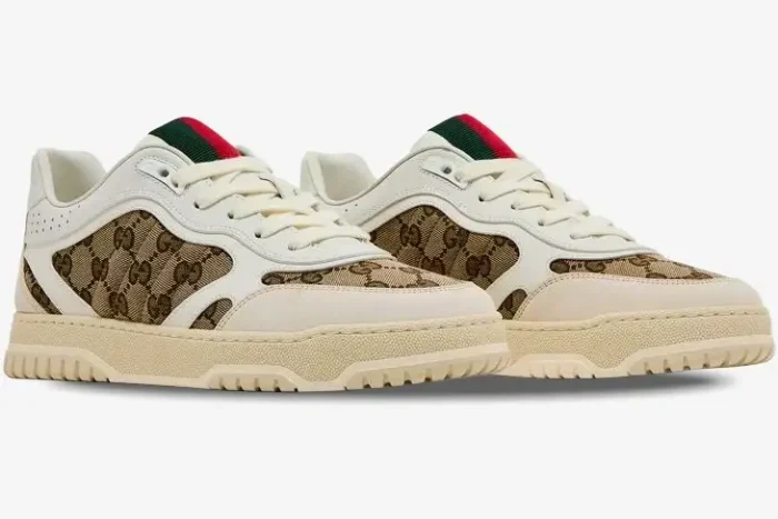 Gucci Re-Web sneakers in white and beige GG monogram canvas, side profile view on a white background. - SKU 787476-AADHW-9573
