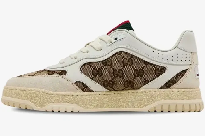 Side view of Gucci Re-Web sneaker featuring white leather, beige suede, and GG monogram canvas. - SKU 787476-AADHW-9573